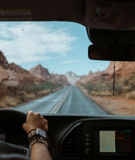 A person driving a car