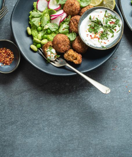 A table topped with plates of food